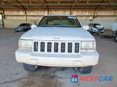 Piąte zdjęcie samochodu w środku: 1998 JEEP GRAND CHEROKEE LIMITED VIN:1J4GZ78YXWC322296 - miniatura