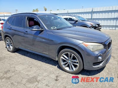 Czwarte zdjęcie samochodu z boku: 2014 BMW X1 XDRIVE28I VIN:WBAVL1C53EVR94953 - miniatura