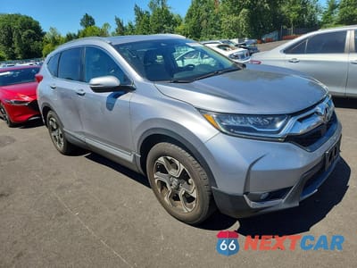 Czwarte zdjęcie samochodu z boku: 2018 HONDA CR-V TOURING VIN:2HKRW1H92JH512734 - miniatura