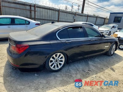 Trzecie zdjęcie samochodu z tyłu: 2015 BMW 740 I VIN:WBAYA6C5XFD827027 - miniatura