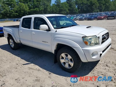 Czwarte zdjęcie samochodu z boku: 2010 TOYOTA TACOMA DOUBLE CAB LONG BED VIN:3TMMU4FN9AM022884 - miniatura