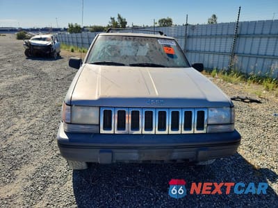 Piąte zdjęcie samochodu w środku: 1995 JEEP GRAND CHEROKEE LAREDO VIN:1J4GZ58S5SC638375 - miniatura