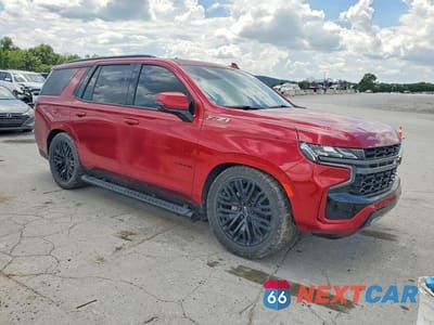 Czwarte zdjęcie samochodu z boku: 2022 CHEVROLET TAHOE K1500 Z71 VIN:1GNSKPKD1NR140015 - miniatura
