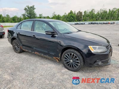 Czwarte zdjęcie samochodu z boku: 2011 VOLKSWAGEN JETTA VIN:3VWGZ7AJ0BM327399 - miniatura