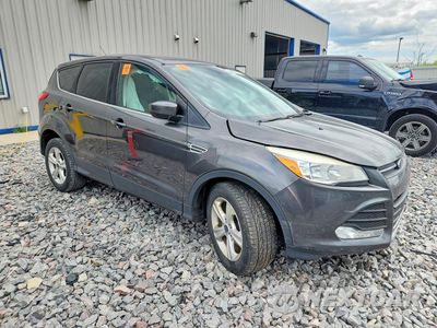 Czwarte zdjęcie samochodu z boku: 2016 FORD ESCAPE SE VIN:1FMCU0G77GUA77001 - miniatura