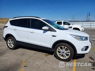 Czwarte zdjęcie samochodu z boku: 2017 FORD ESCAPE SE VIN:1FMCU9G90HUD53557 - miniatura