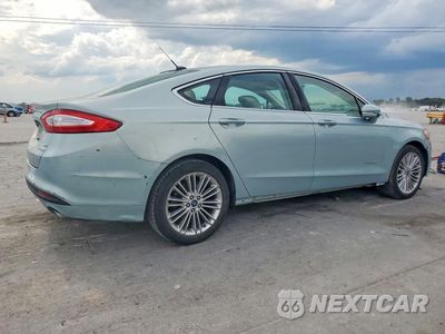 Trzecie zdjęcie samochodu z tyłu: 2014 FORD FUSION SE HYBRID VIN:3FA6P0LU4ER198499 - miniatura