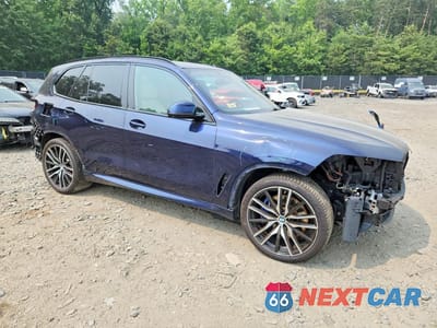 Czwarte zdjęcie samochodu z boku: 2020 BMW X5 XDRIVE40I VIN:5UXCR6C08L9C70418 - miniatura