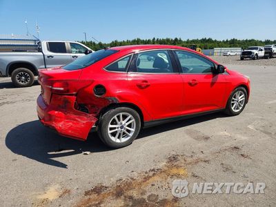 Trzecie zdjęcie samochodu z tyłu: 2017 FORD FOCUS SE VIN:1FADP3F22HL326924 - miniatura