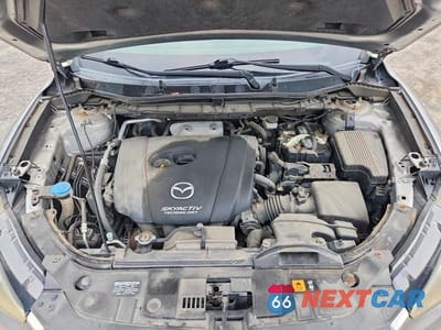 Zdjęcie 12 z 13 samochodu: 2014 MAZDA CX-5 TOURING VIN:JM3KE4CY6E0334647 - miniatura
