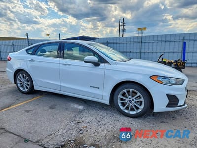 Czwarte zdjęcie samochodu z boku: 2019 FORD FUSION SE VIN:3FA6P0LU5KR188558 - miniatura