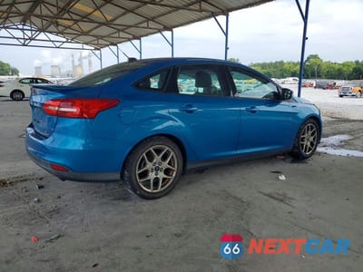 Trzecie zdjęcie samochodu z tyłu: 2015 FORD FOCUS SE VIN:1FADP3F23FL247159 - miniatura
