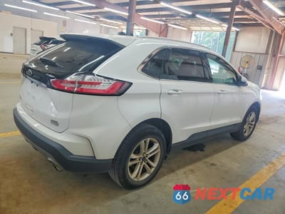 Trzecie zdjęcie samochodu z tyłu: 2019 FORD EDGE SEL VIN:2FMPK3J95KBC24109 - miniatura