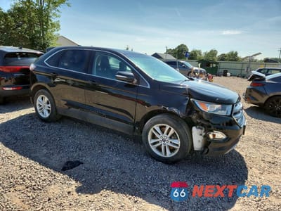 Czwarte zdjęcie samochodu z boku: 2018 FORD EDGE SEL VIN:2FMPK4J95JBC45093 - miniatura