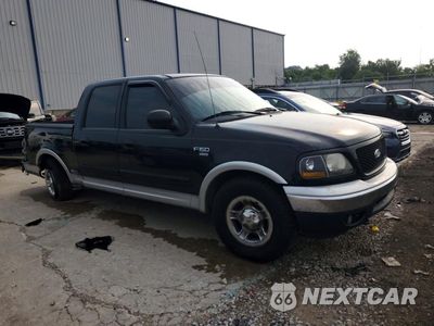 Czwarte zdjęcie samochodu z boku: 2001 FORD F150 SUPERCREW VIN:1FTRW07L61KD77458 - miniatura