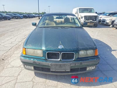 Piąte zdjęcie samochodu w środku: 1995 BMW 318 IS VIN:WBABE5326SJA11456 - miniatura