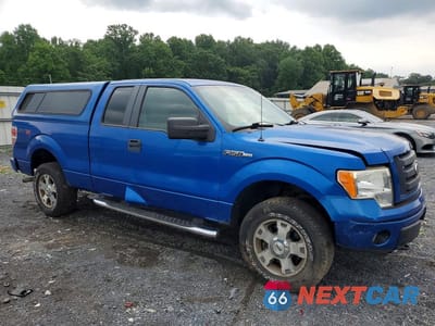 Czwarte zdjęcie samochodu z boku: 2010 FORD F150 SUPER CAB VIN:1FTEX1EW1AFA11981 - miniatura
