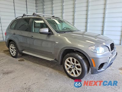 Czwarte zdjęcie samochodu z boku: 2012 BMW X5 XDRIVE35I VIN:5UXZV4C51CL752203 - miniatura
