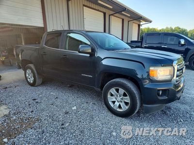 Czwarte zdjęcie samochodu z boku: 2018 GMC CANYON SLE VIN:1GTG5CEA1J1174691 - miniatura
