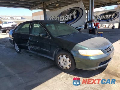 Czwarte zdjęcie samochodu z boku: 1999 HONDA ACCORD LX VIN:JHMCG6658XC025587 - miniatura