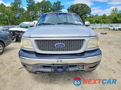 Piąte zdjęcie samochodu w środku: 1999 FORD F150 VIN:1FTRX18W4XNA79350 - miniatura