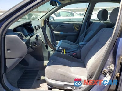 Zdjęcie 7 z 12 samochodu: 2000 TOYOTA CAMRY LE VIN:JT2BG22K5Y0460029 - miniatura