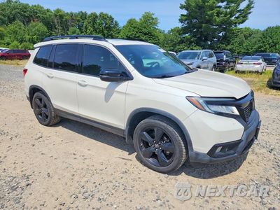 Czwarte zdjęcie samochodu z boku: 2019 HONDA PASSPORT ELITE VIN:5FNYF8H0XKB009202 - miniatura