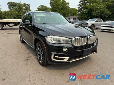 Czwarte zdjęcie samochodu z boku: 2015 BMW X5 XDRIVE50I VIN:5UXKR6C50F0J77597 - miniatura