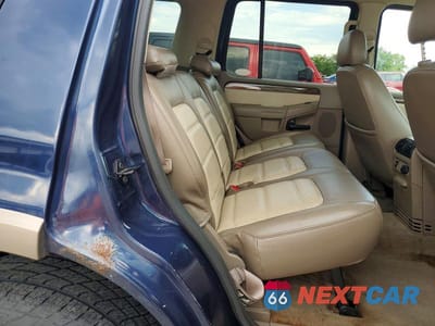 Zdjęcie 11 z 13 samochodu: 2002 FORD EXPLORER EDDIE BAUER VIN:1FMZU74KX2UD46256 - miniatura