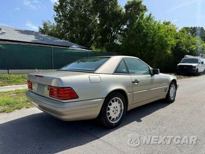 Czwarte zdjęcie samochodu z boku: 1996 MERCEDES-BENZ SL 500 VIN:WDBFA67F2TF131418 - miniatura