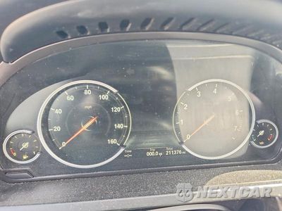 Zdjęcie 9 z 12 samochodu: 2015 BMW 750 LI VIN:WBAYE8C59FD781884 - miniatura