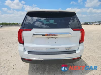 Zdjęcie 6 z 13 samochodu: 2022 GMC YUKON SLT VIN:1GKS1BKT6NR188927 - miniatura