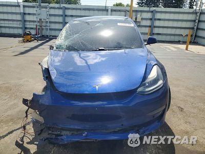 Piąte zdjęcie samochodu w środku: 2021 TESLA MODEL 3 VIN:5YJ3E1EA0MF061538 - miniatura