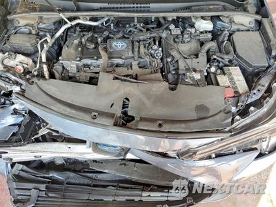 Zdjęcie 11 z 12 samochodu: 2023 TOYOTA COROLLA HYBRID LE VIN:JTDBDMHE5P3004431 - miniatura