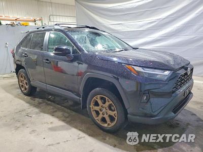 Czwarte zdjęcie samochodu z boku: 2024 TOYOTA RAV4 WOODLAND EDITION VIN:2T3UWRFV0RW189197 - miniatura