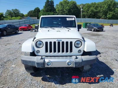 Piąte zdjęcie samochodu w środku: 2017 JEEP WRANGLER UNLIMITED SAHARA VIN:1C4BJWEG7HL594174 - miniatura