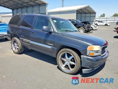 Czwarte zdjęcie samochodu z boku: 2003 GMC YUKON VIN:1GKEC13VX3R311711 - miniatura