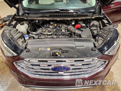 Zdjęcie 12 z 13 samochodu: 2020 FORD EDGE TITANIUM VIN:2FMPK4K94LBA38857 - miniatura