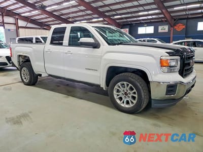 Czwarte zdjęcie samochodu z boku: 2015 GMC SIERRA K1500 VIN:1GTV2TECXFZ419031 - miniatura