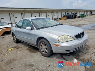 Czwarte zdjęcie samochodu z boku: 2002 MERCURY SABLE GS VIN:1MEFM50U82A634005 - miniatura
