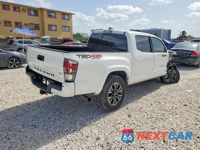 Trzecie zdjęcie samochodu z tyłu: 2023 TOYOTA TACOMA TRD SPORT VIN:3TMCZ5AN1PM621748 - miniatura