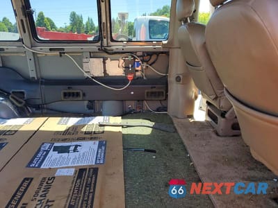 Zdjęcie 11 z 14 samochodu: 2002 CHEVROLET EXPRESS G1500 VIN:1GBFG65R121102649 - miniatura