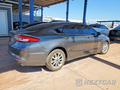 Trzecie zdjęcie samochodu z tyłu: 2017 FORD FUSION SE HYBRID VIN:3FA6P0LUXHR280080 - miniatura