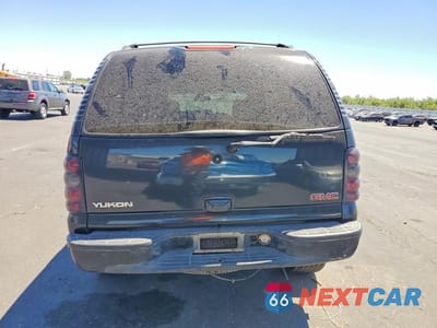 Zdjęcie 6 z 13 samochodu: 2003 GMC YUKON VIN:1GKEC13VX3R311711 - miniatura