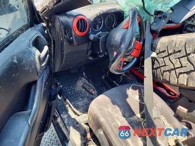 Zdjęcie 8 z 12 samochodu: 2014 JEEP WRANGLER UNLIMITED SAHARA VIN:1C4BJWEG5EL197848 - miniatura