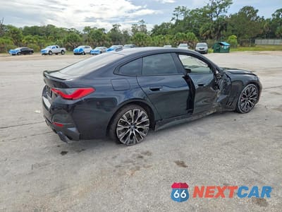Trzecie zdjęcie samochodu z tyłu: 2022 BMW 4ER 430I GRAN COUPE VIN:WBA63AV06NFM12750 - miniatura