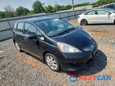 Czwarte zdjęcie samochodu z boku: 2010 HONDA FIT SPORT VIN:JHMGE8G42AC002712 - miniatura