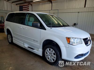 Czwarte zdjęcie samochodu z boku: 2014 DODGE GRAND CARAVAN SE VIN:2C4RDGBG5ER312097 - miniatura