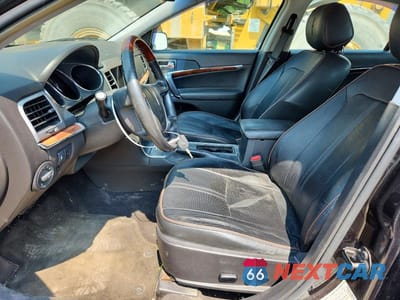 Zdjęcie 7 z 12 samochodu: 2012 LINCOLN MKZ VIN:3LNHL2JCXCR818107 - miniatura