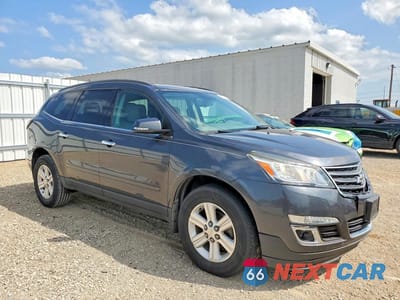 Czwarte zdjęcie samochodu z boku: 2013 CHEVROLET TRAVERSE LT VIN:1GNKRGKD0DJ101327 - miniatura